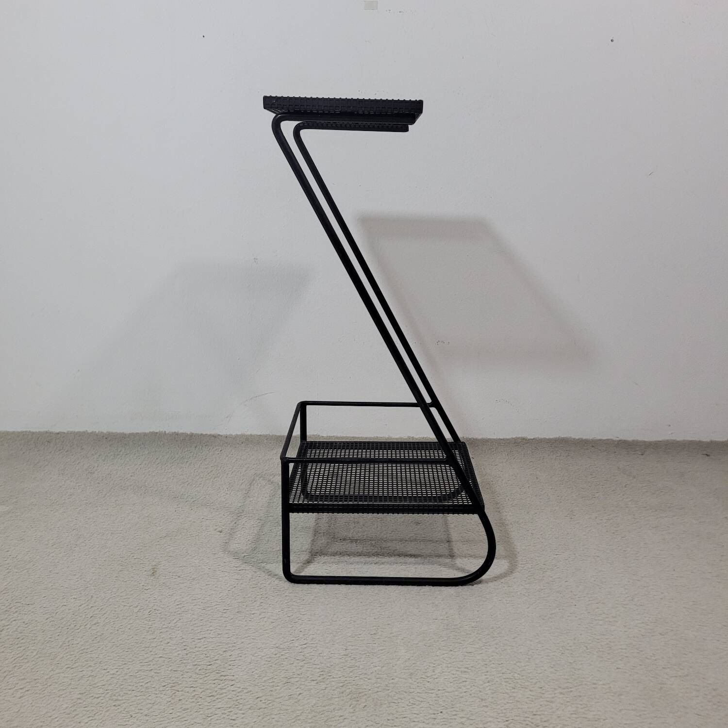 Furniture or side table in black lacquered perforated metal 1950s