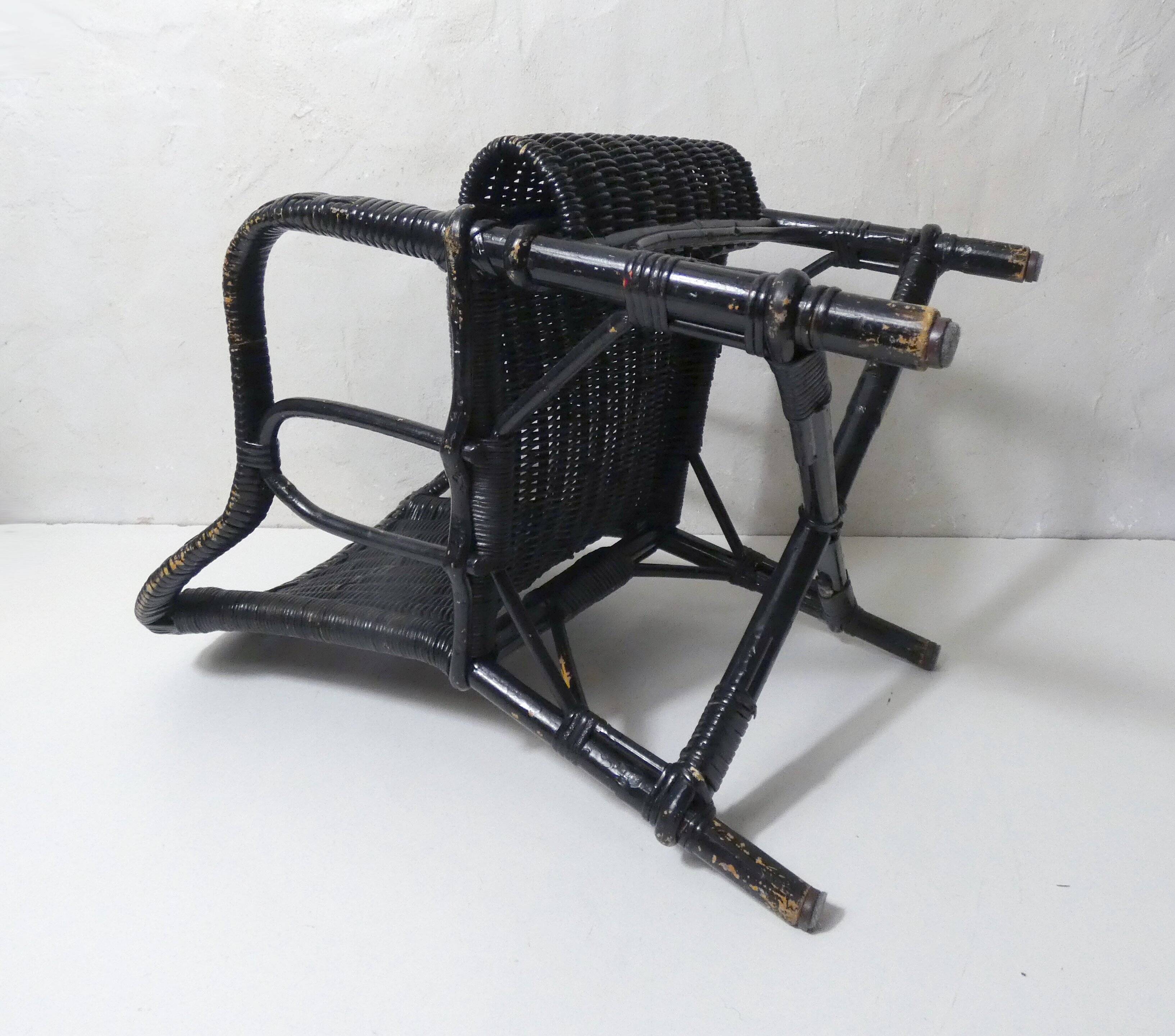 Vintage children's size rattan armchair