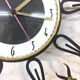 Horloge Bayard vintage dorée 1970