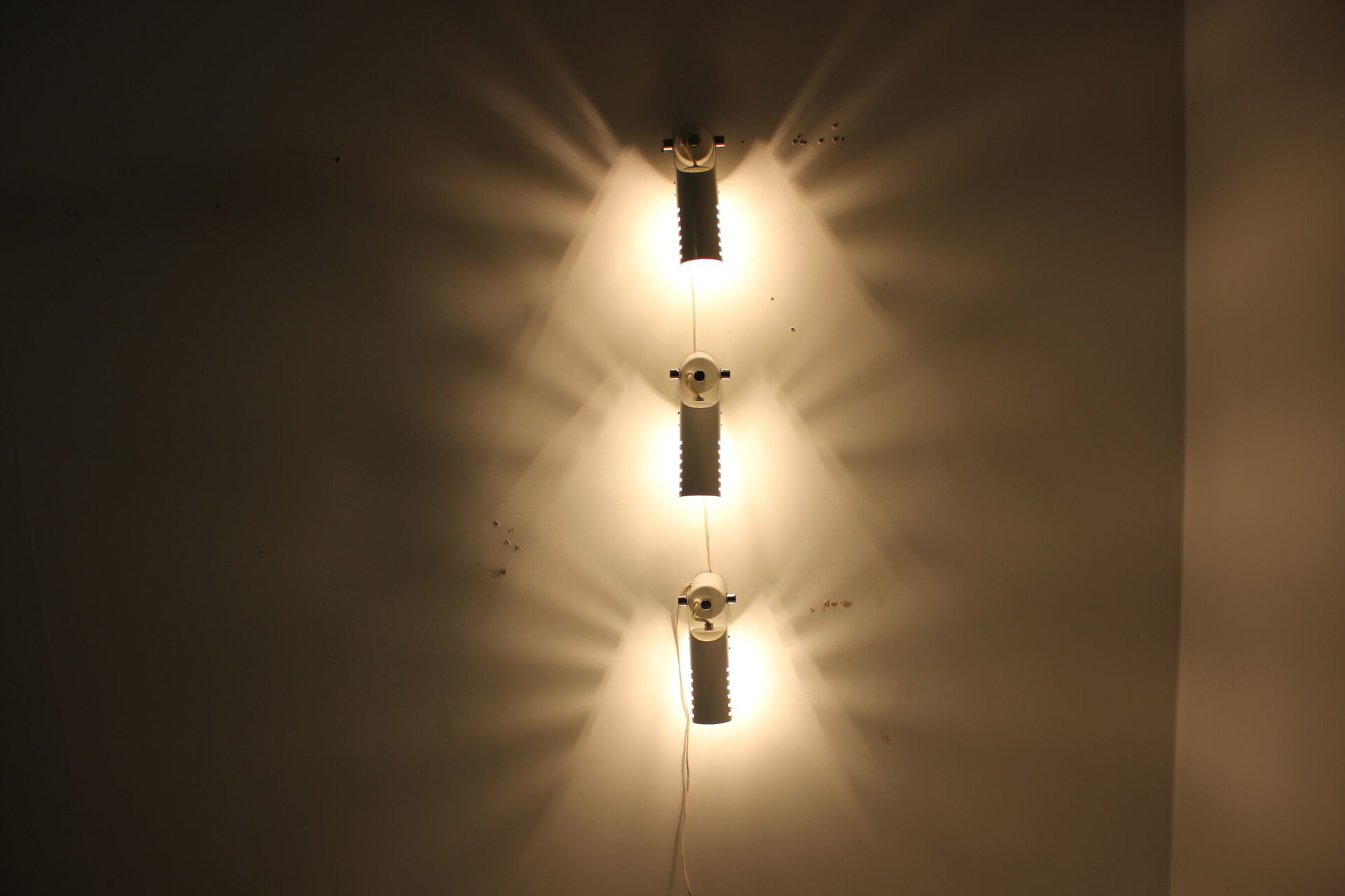 Set of three white adjustable design wall lamp, 1980's.