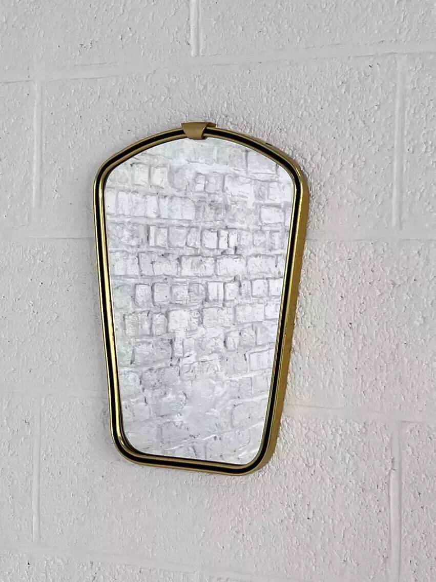 Rearview mirror and free form from the 60s brass frame highlighted with black
