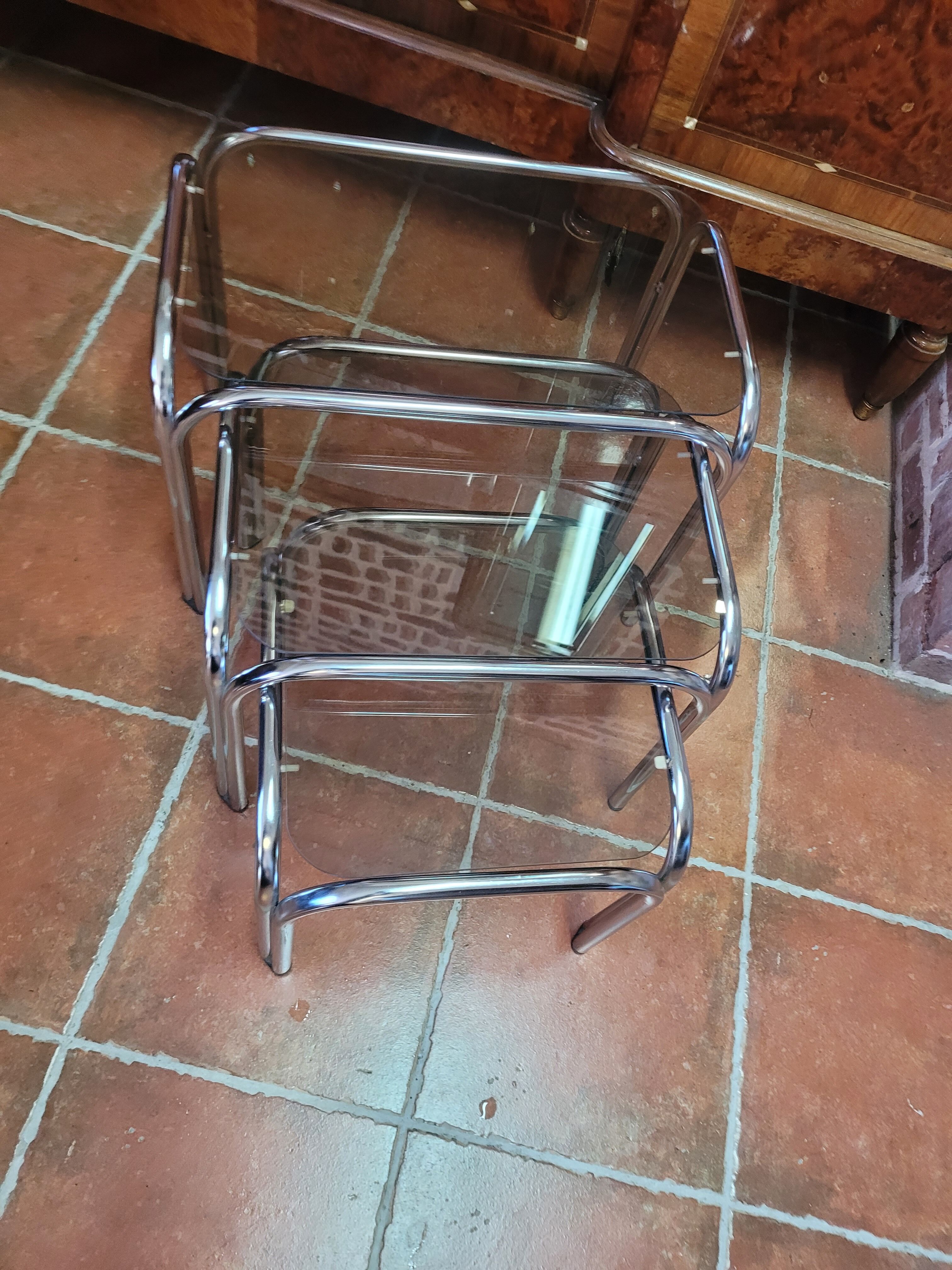 Chrome nesting table with smoked glass top from the 70s