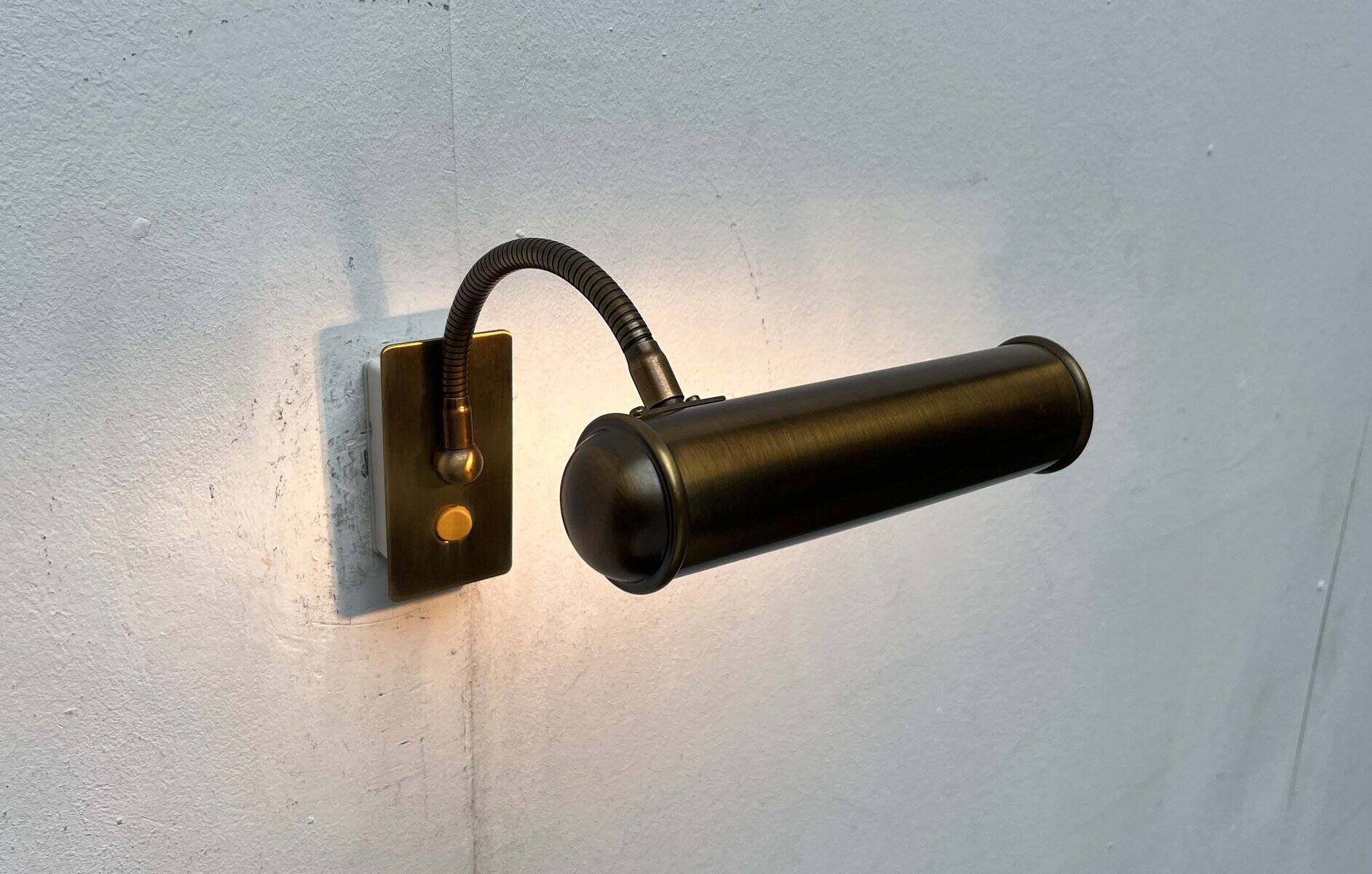 Vintage German brass patinated wall lamp with a gooseneck design by Honsel, 1970s.