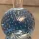 Vase soliflore à long col sur base boule sulfure