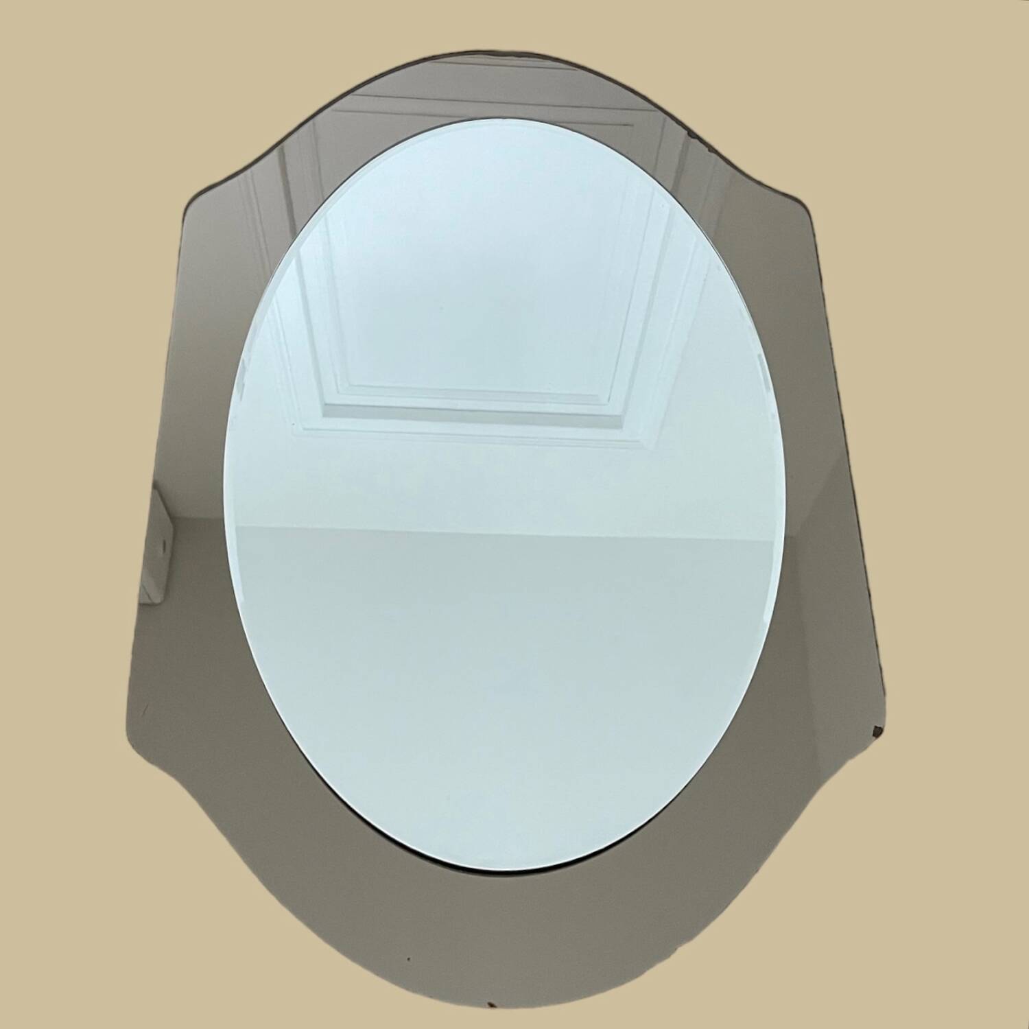 Miroir en verre fumé bicolore, vers 1970