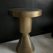 Sculptural metal side table, contemporary brassy side for modern interiors