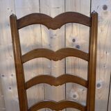 Set of 8 rustic high-back straw chairs.