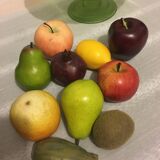 Glass cup and dummy fruit