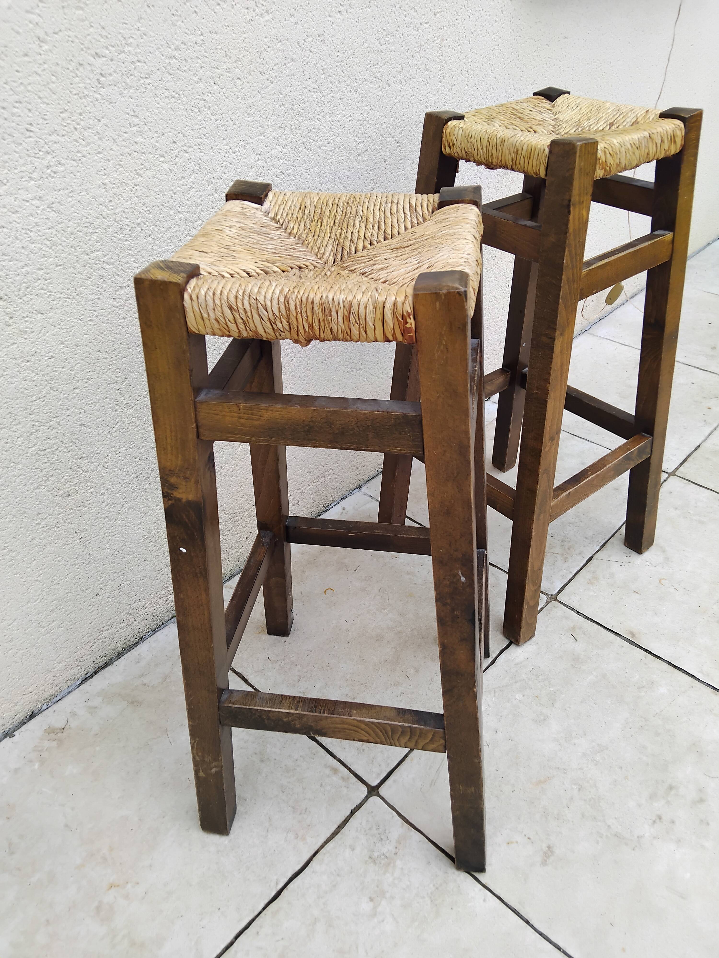 Pair of vintage stools with straw seats
