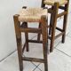 Pair of vintage stools with straw seats