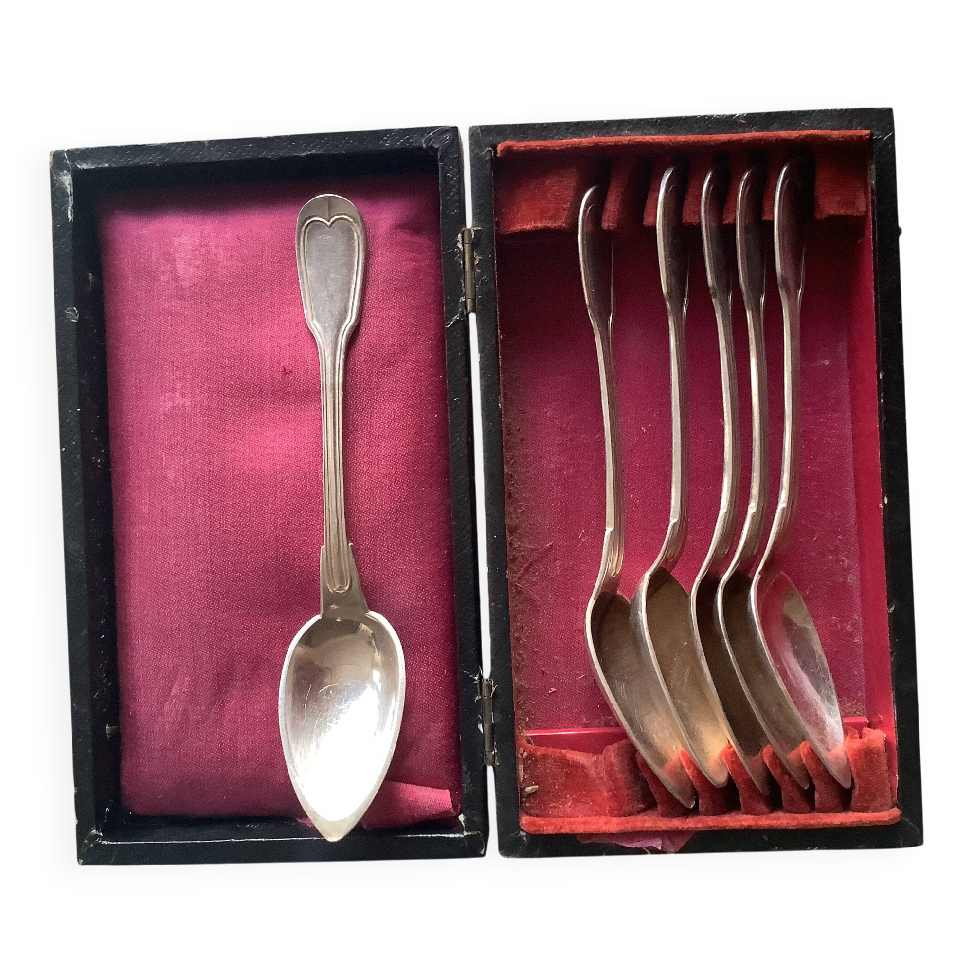 Small silver-plated metal spoons
