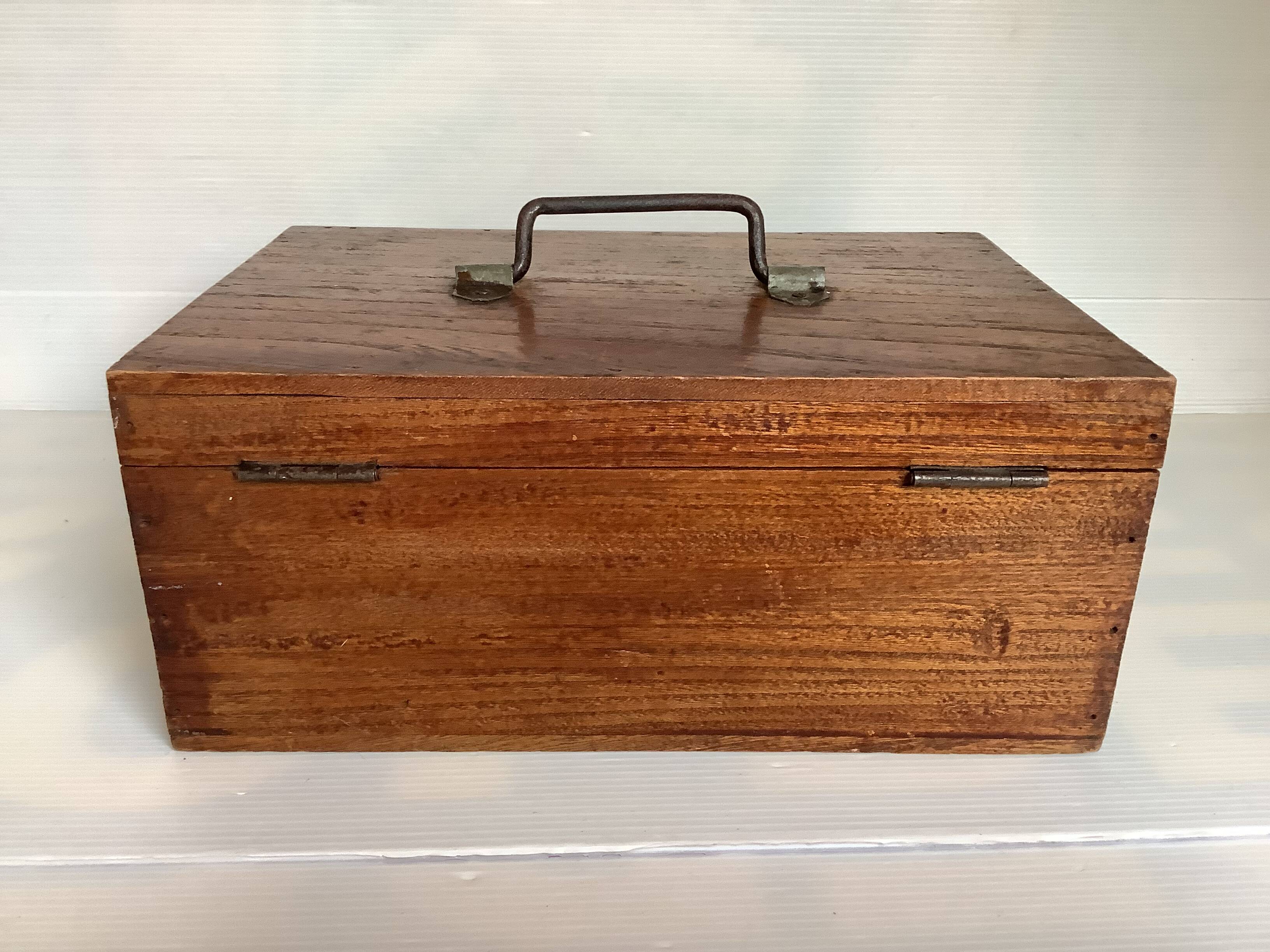 Old wooden box with handle
