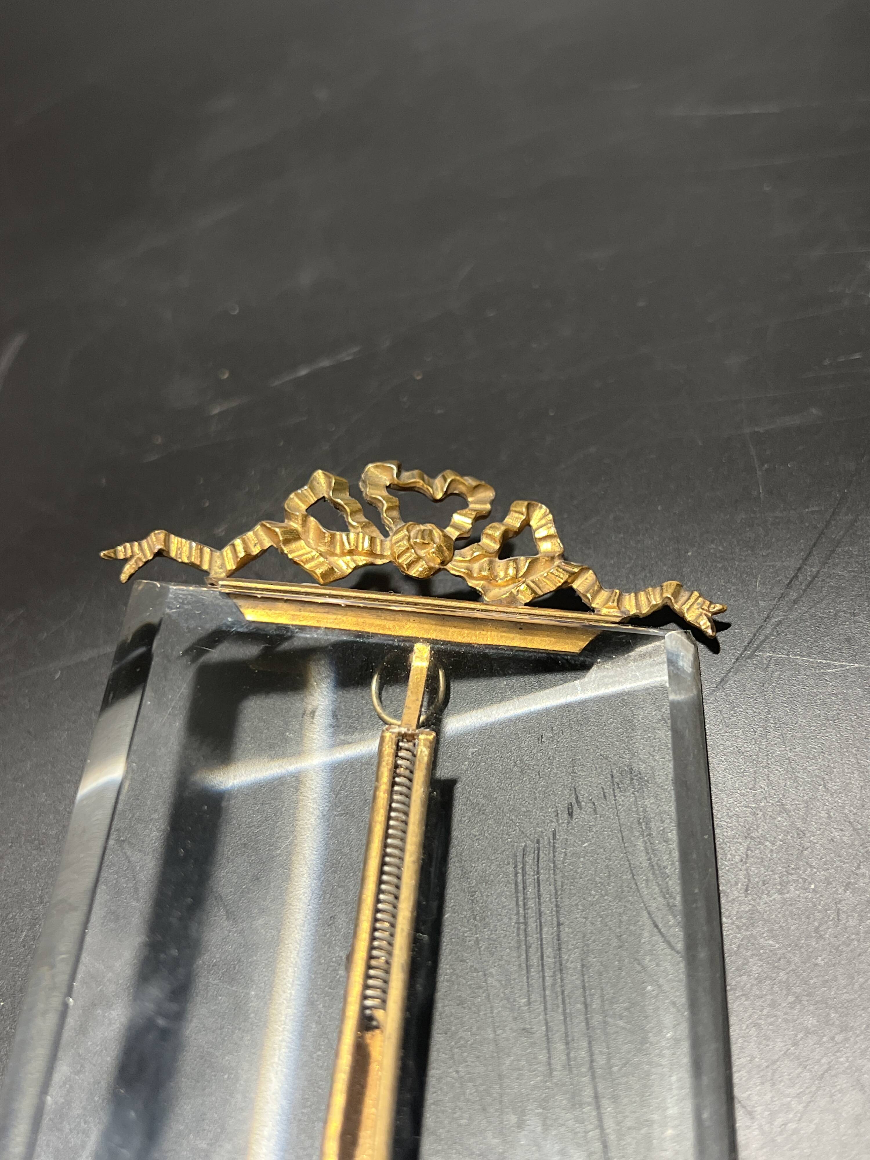 Glass and metal frame