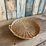 Antique flat round rattan basket