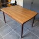 Extendable Scandinavian teak table by Johannes Andersen for Samcom Denmark.