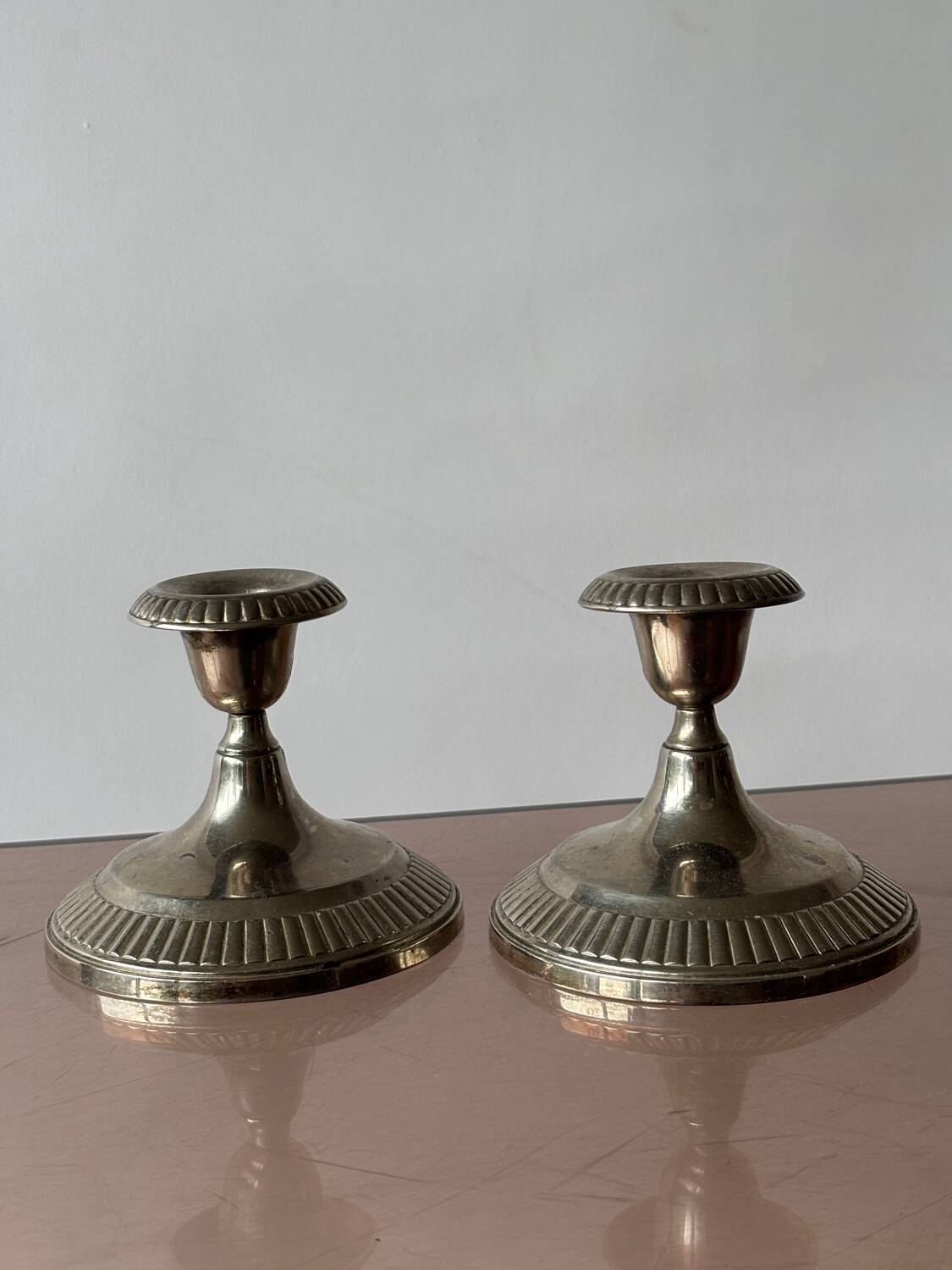Antique silver-plated metal candlesticks
