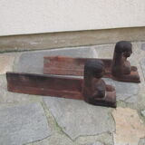 Pair of ancient cast iron chenets, Egyptian busts