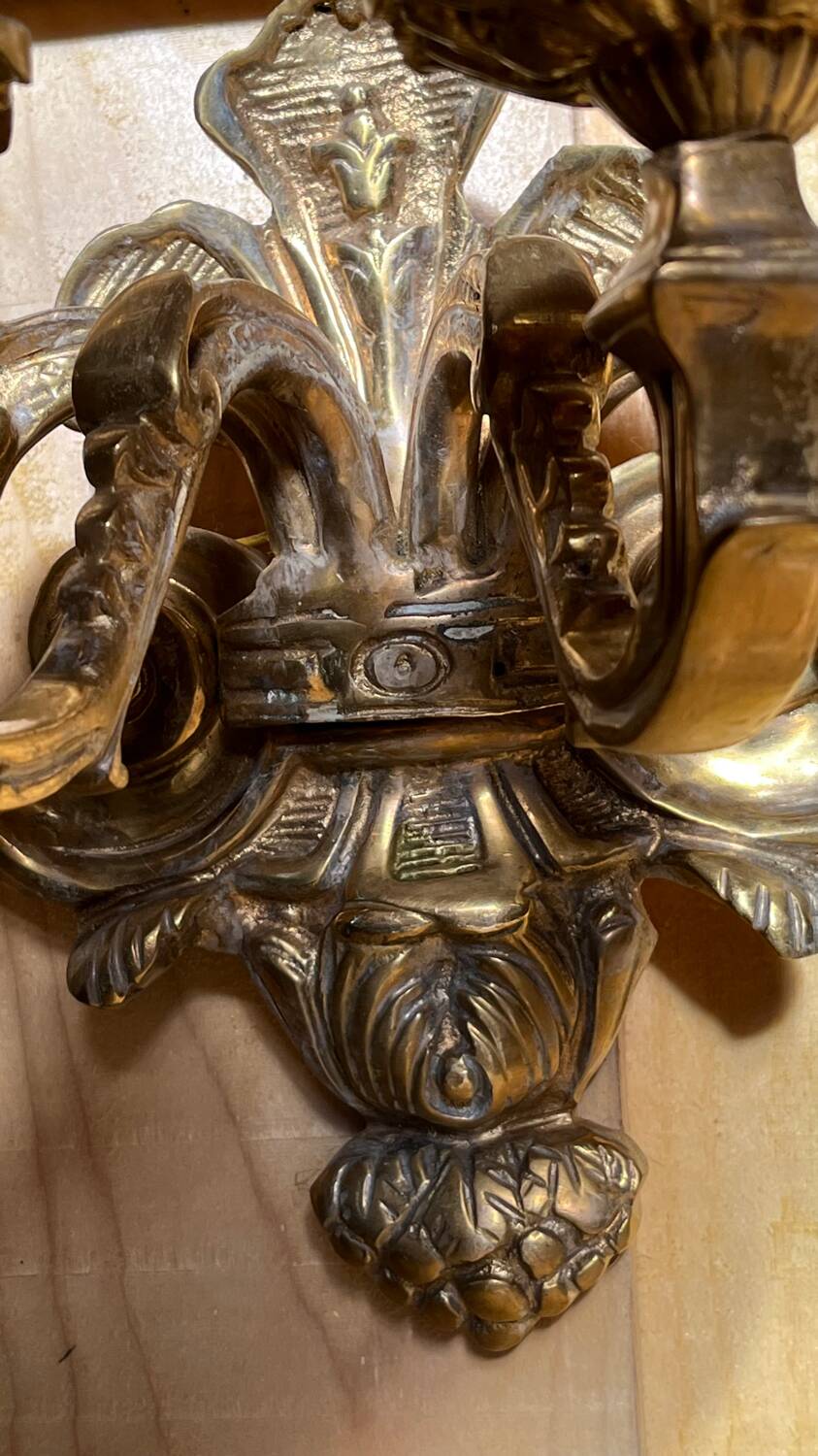 Pair of LXV style gilt bronze wall lights