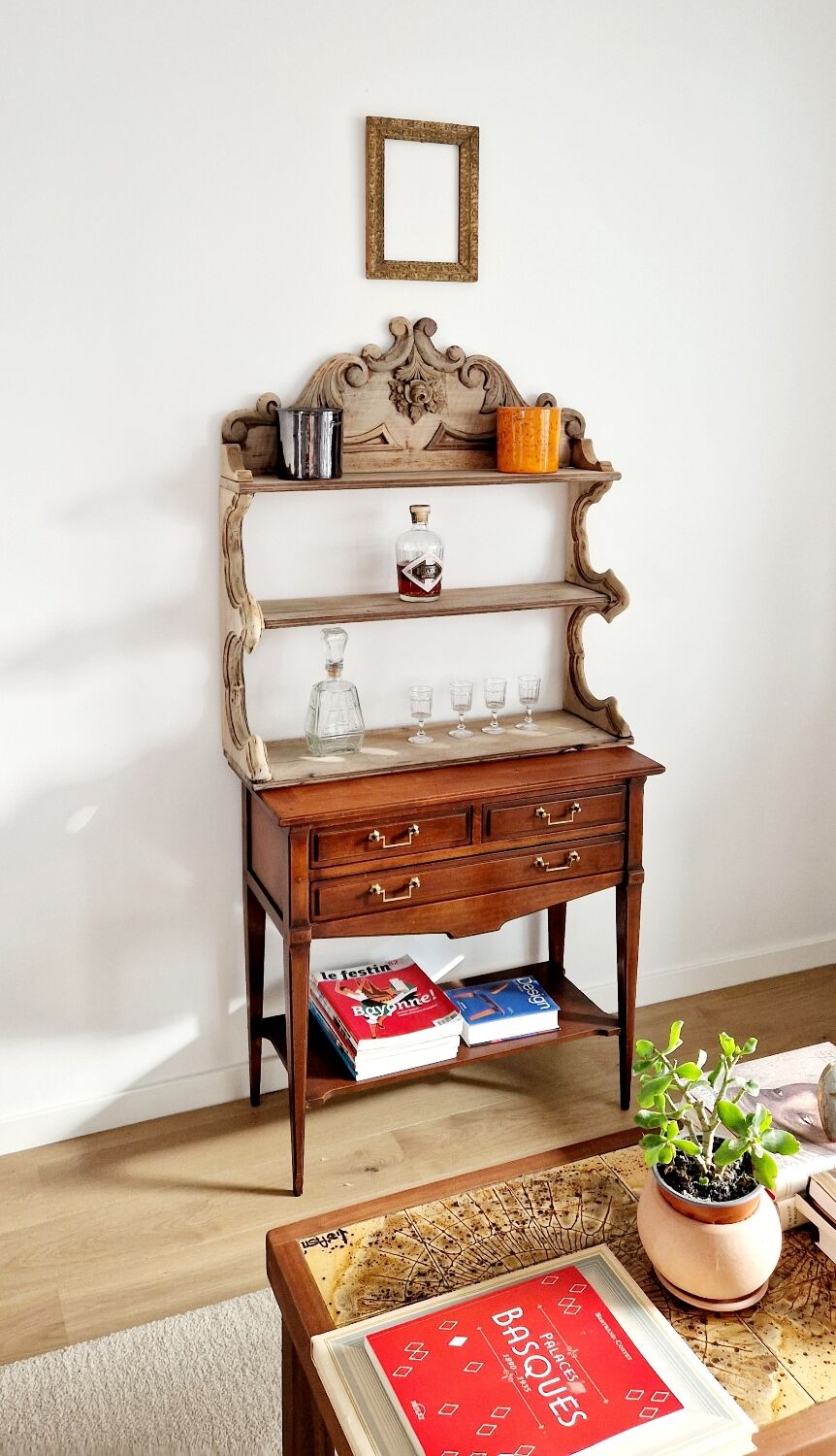 Old wall shelf carved in walnut