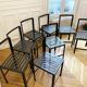 Set of 8 patinated and waxed raw steel chairs