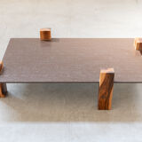 Handcrafted coffee table with ceramic glass top and walnut legs
