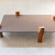 Handcrafted coffee table with ceramic glass top and walnut legs