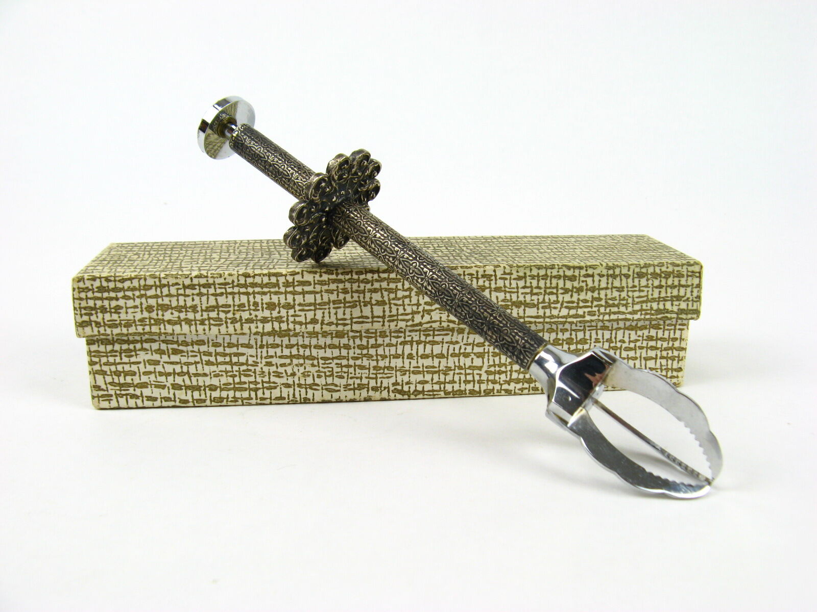 Sugar tongs in its case