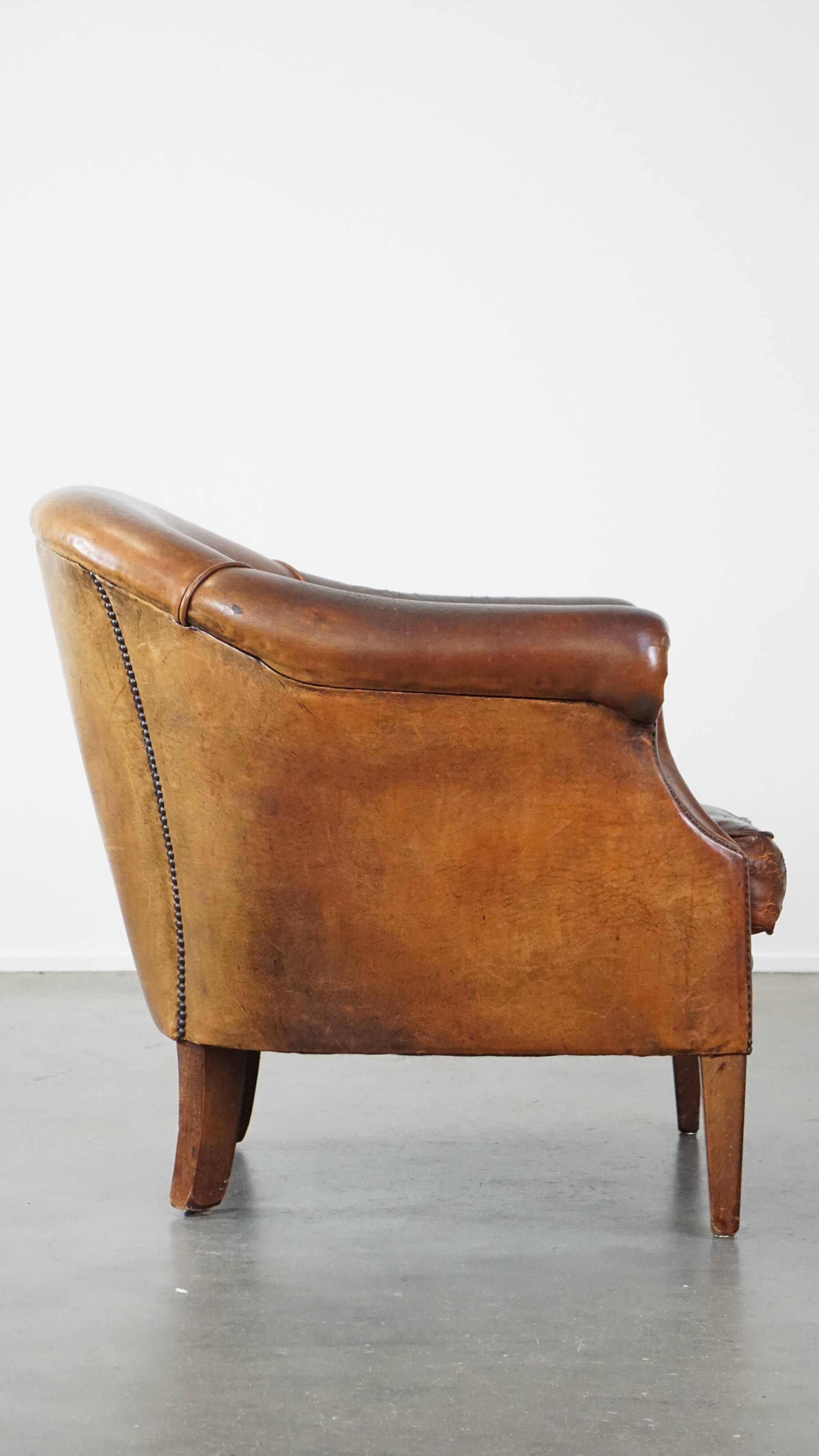 Vintage club armchair in sheepskin leather