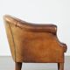Vintage club armchair in sheepskin leather