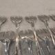 11 silver-plated oyster forks by Orbrille, 13.2cm