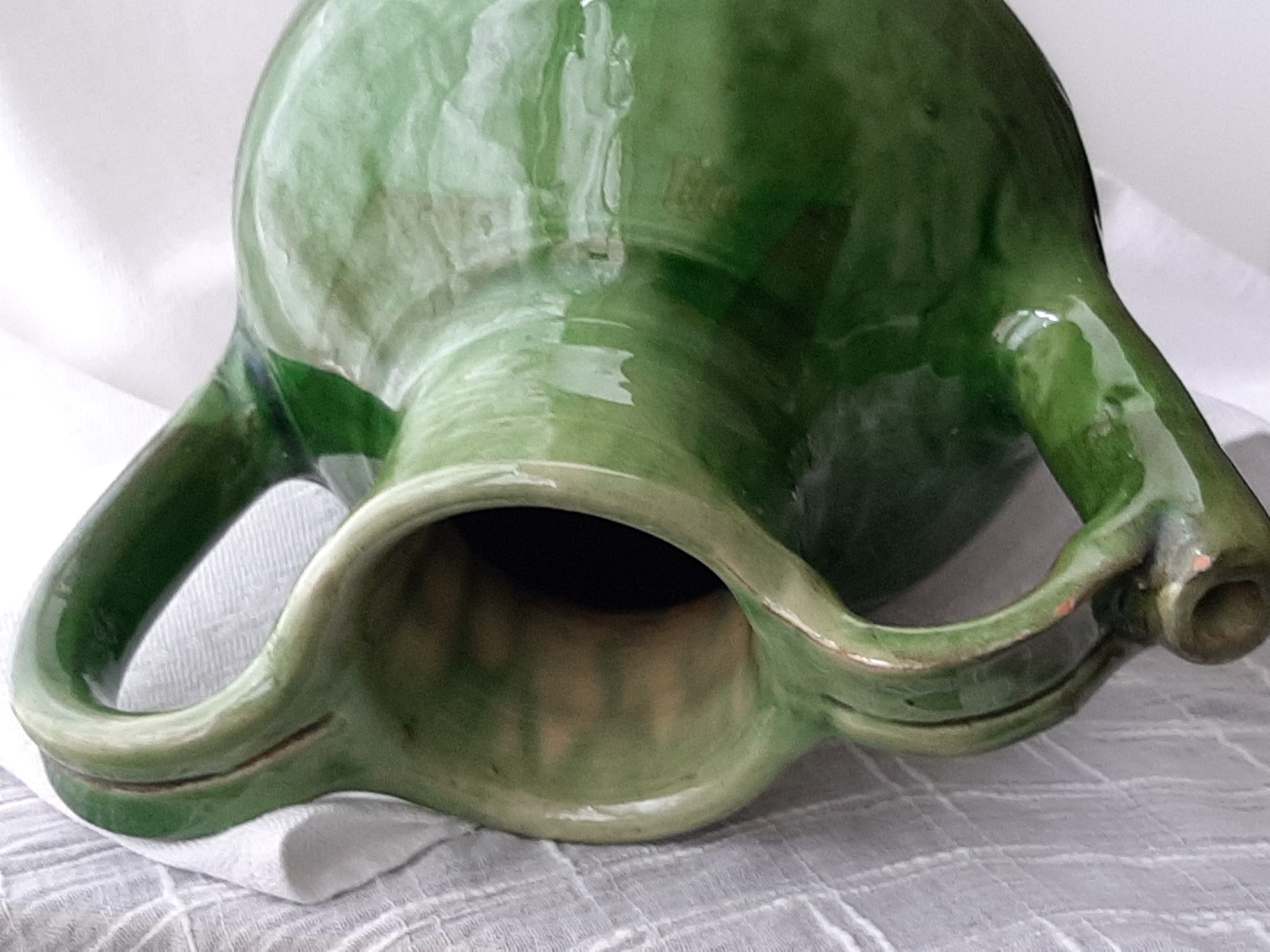 Old glazed terracotta pitcher