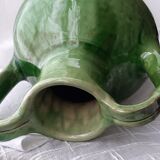 Old glazed terracotta pitcher