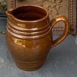 Pitcher old cider jug in glazed sandstone