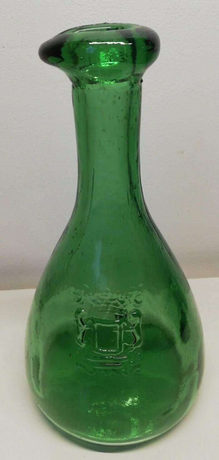 Glass bottles with coat of arms
