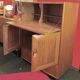 Ercol English wooden secretary, on wheels – 1970s.