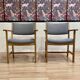 A PAIR OF ARMCHAIRS STAMPED "HANS WEGNER" 1960.