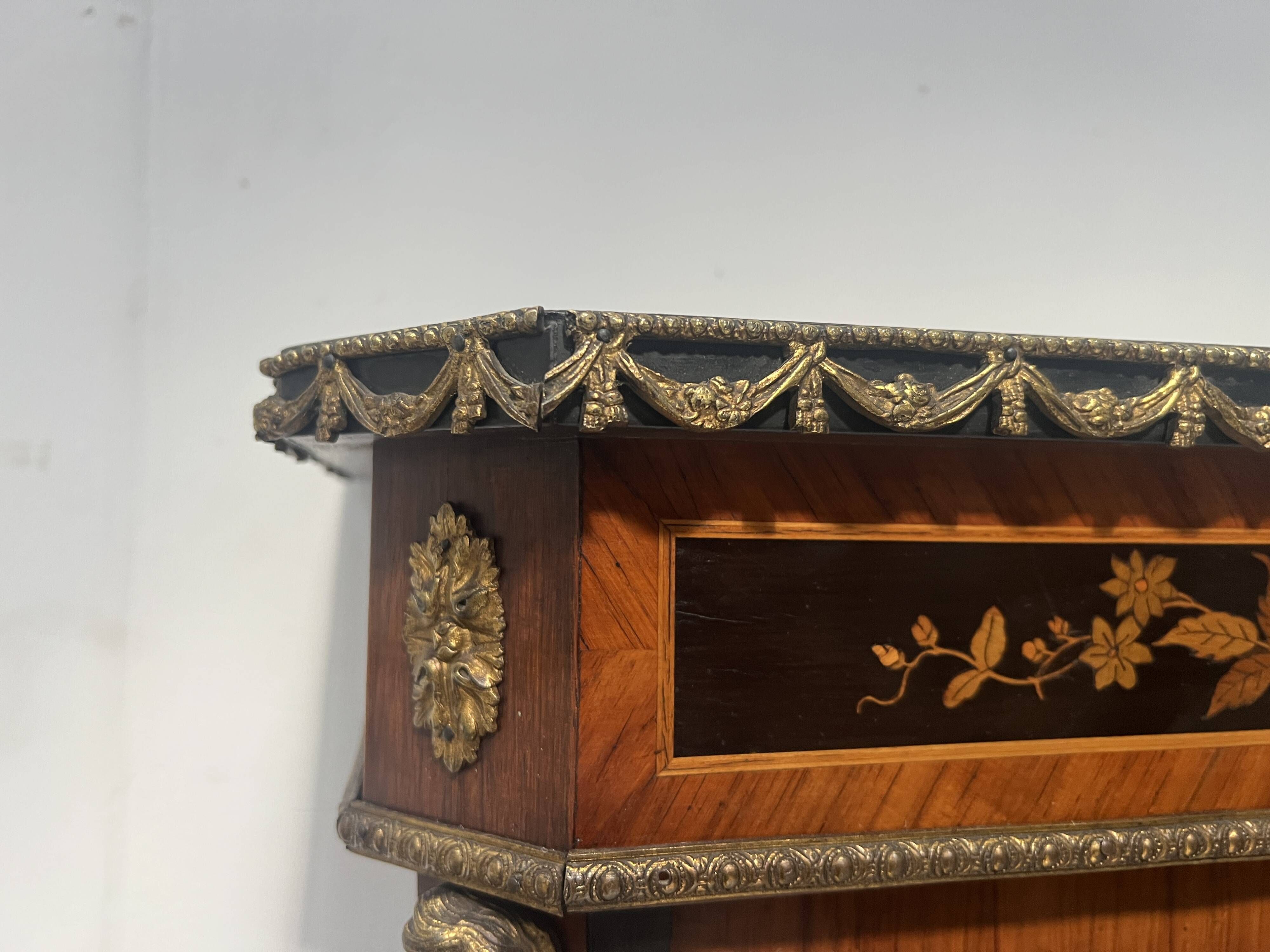 Napoleon III display cabinet in rosewood veneer and marquetry, 19th century.