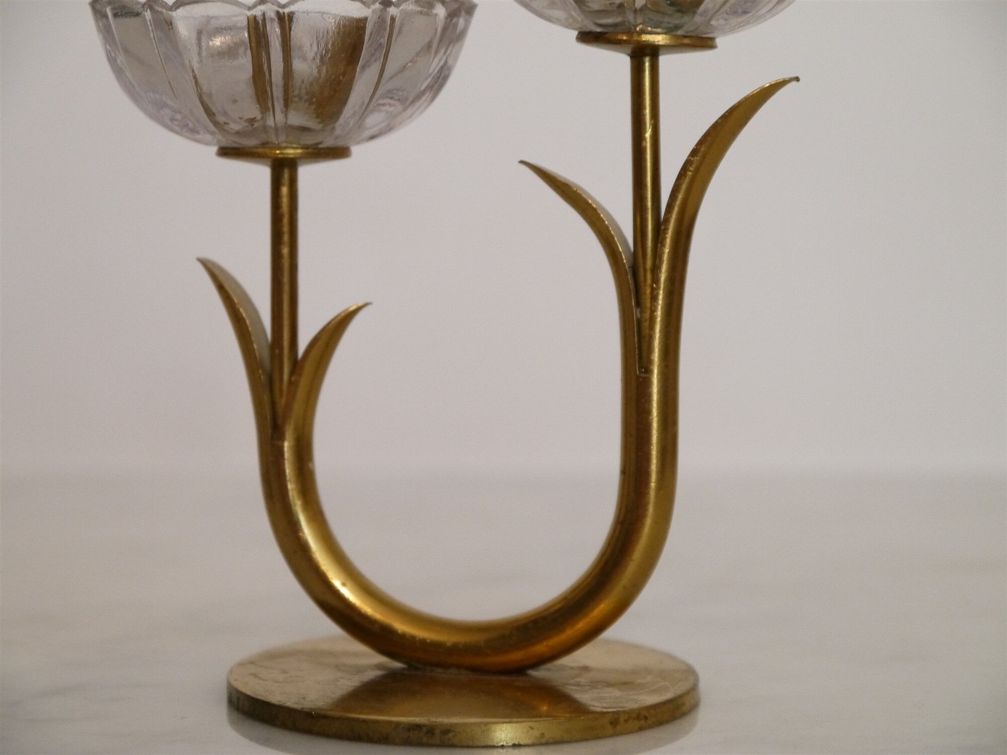 Pair of Scandinavian candlesticks made of brass and glass