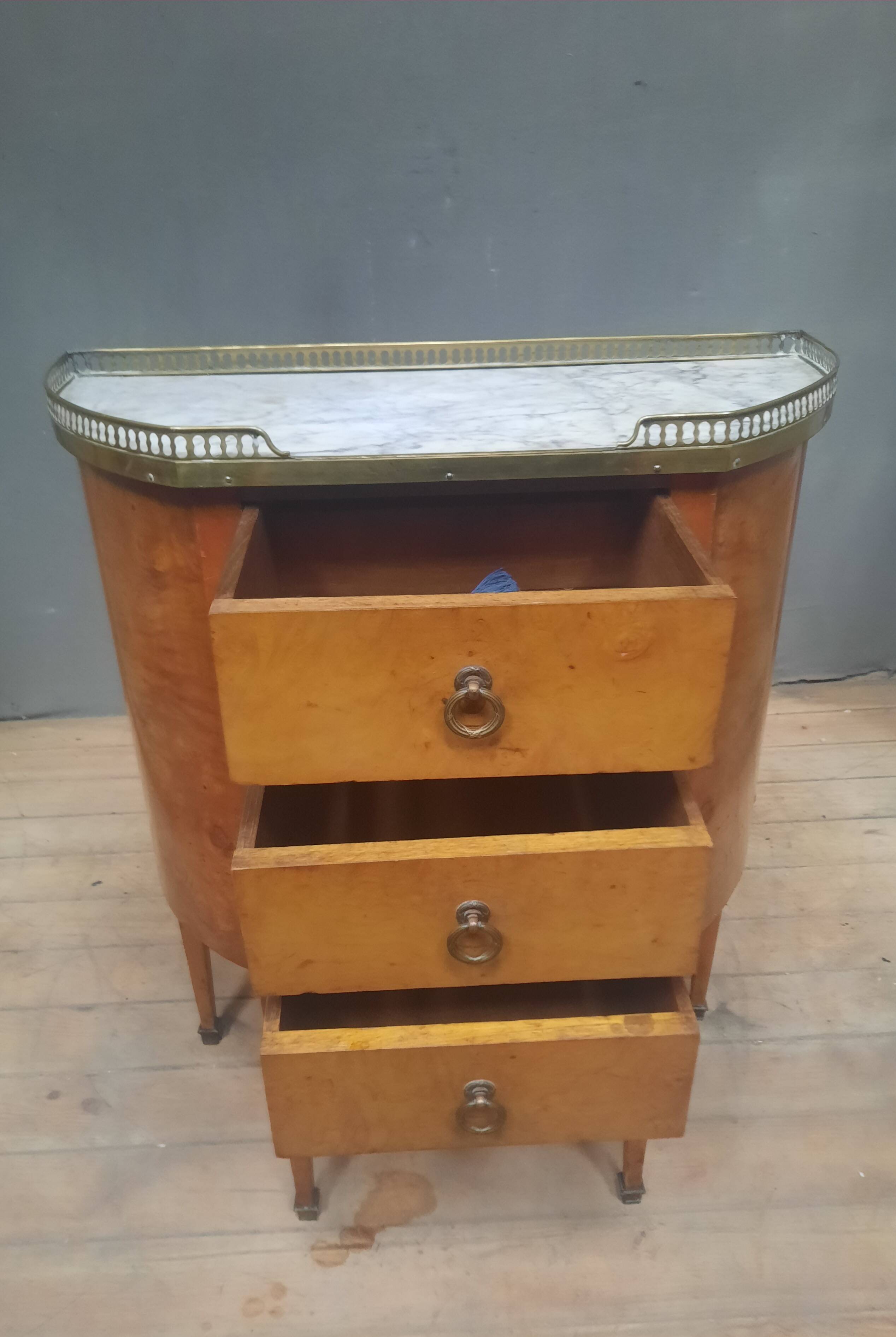 Small Louis XVI style chest of drawers with rounded sides