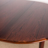 Danish extendable dining table in Rio Rosewood model 55 by Arne Vodder for Sibast 1958.