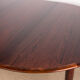 Danish extendable dining table in Rio Rosewood model 55 by Arne Vodder for Sibast 1958.