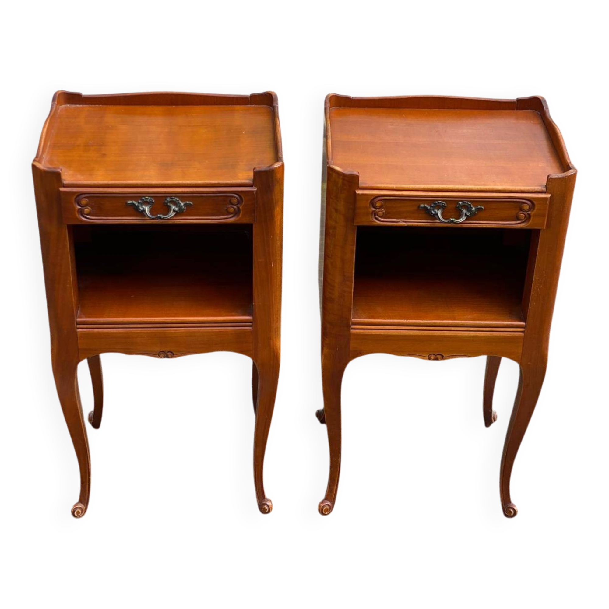 2 Louis XV bedside tables made of curved solid wood with drawers.