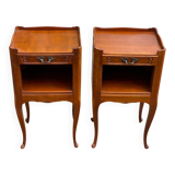2 Louis XV bedside tables made of curved solid wood with drawers.