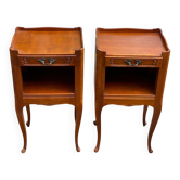 2 Louis XV bedside tables made of curved solid wood with drawers.