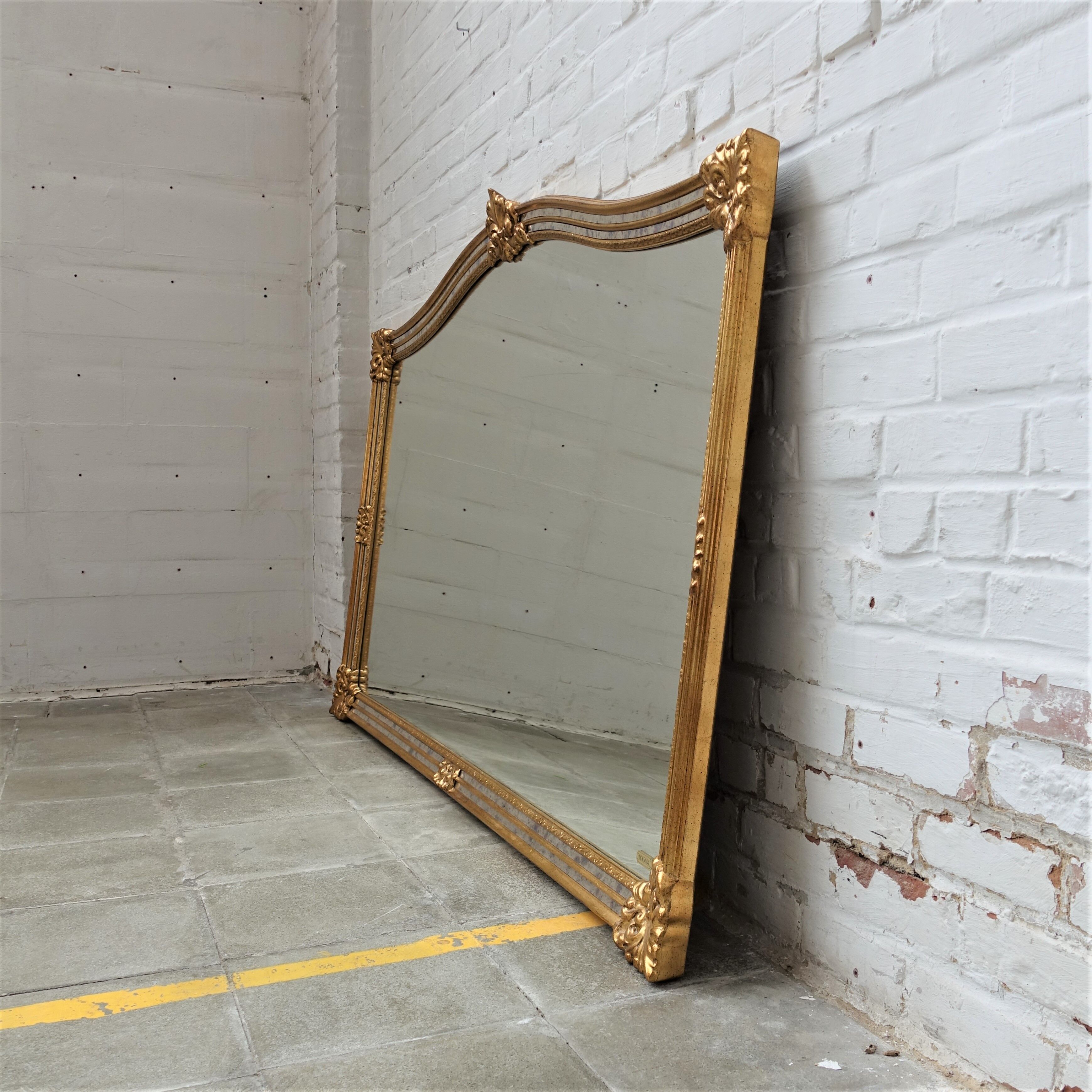 Vintage gilded Deknudt mirror