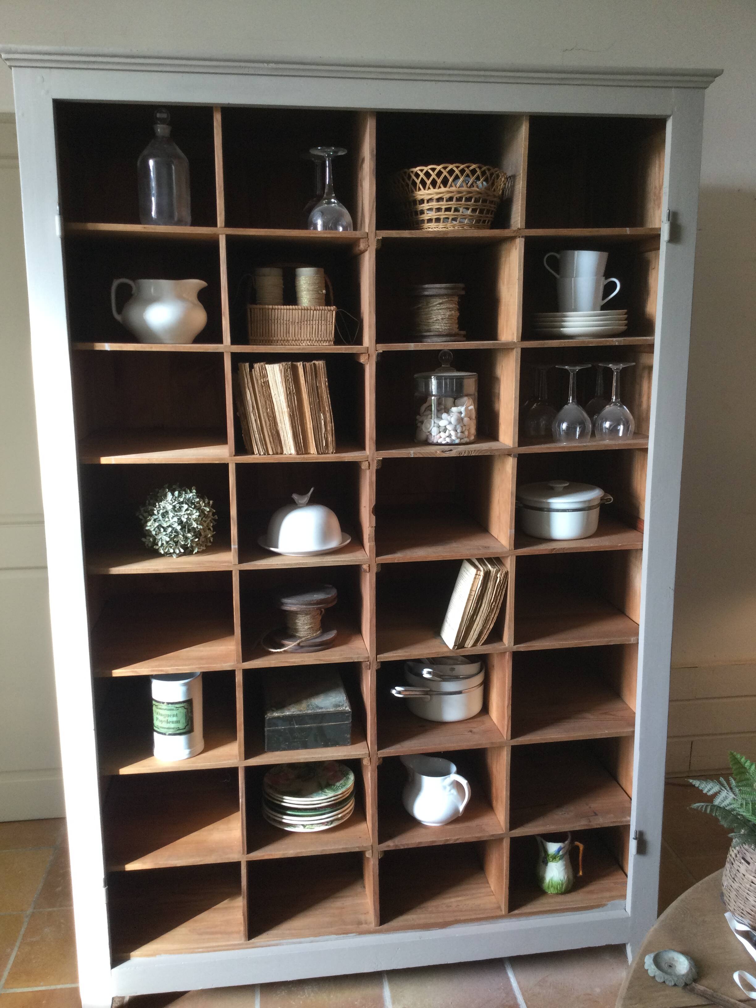 Antique Parisian wardrobe with interior compartments.