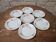 7 dessert plates in porcelain with a violet lilac design and a gold rim.