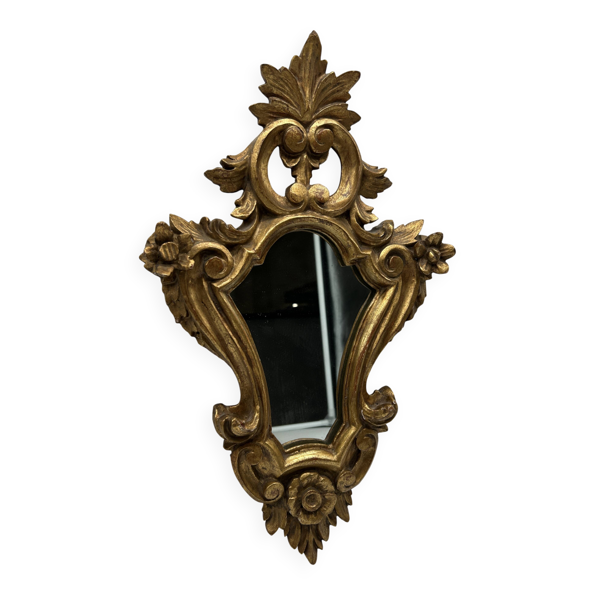 Wooden mirror with gilded stucco