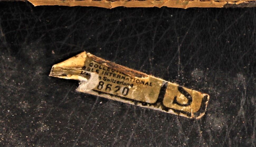 Armchair and footstool by André Vandenbeuck for Strässle in black leather