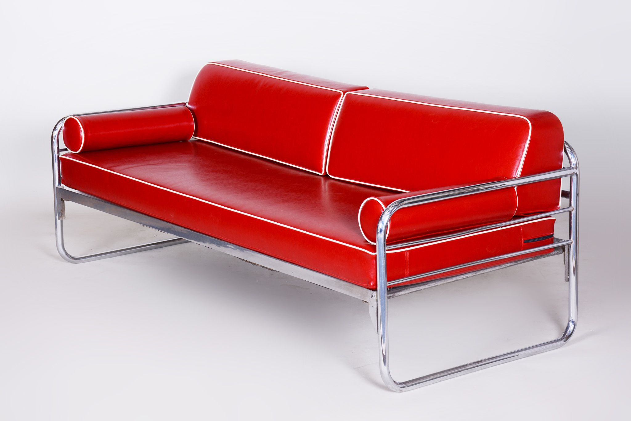Red leather sofa by Hynekk Gottwald 1930